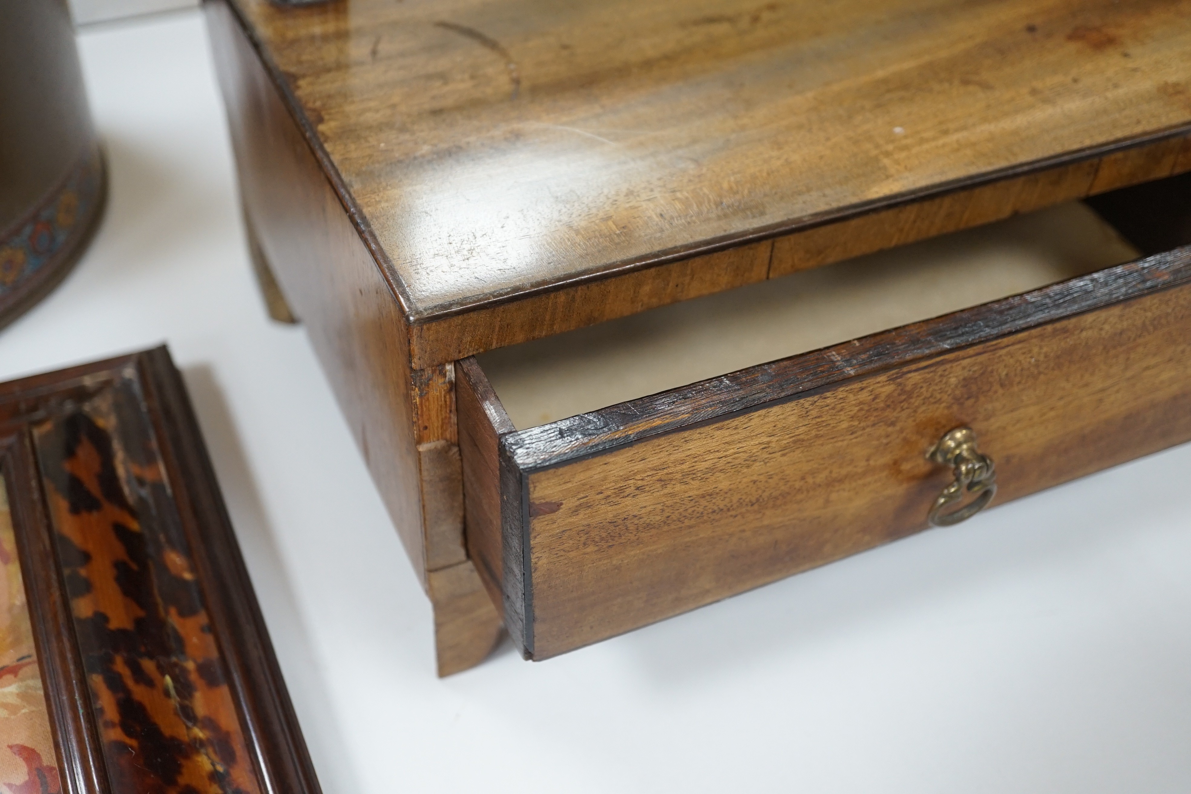 A 19th century mahogany toilet mirror, 49 cms high